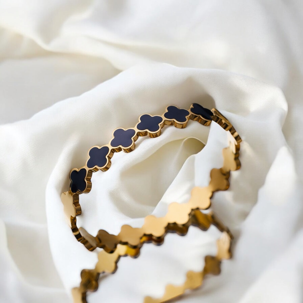 FAMOUS BLACK BANGLE